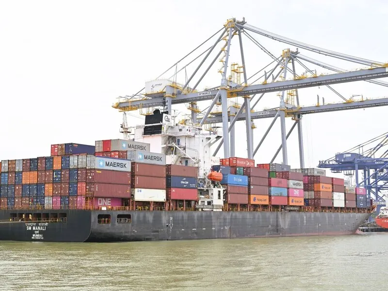 A container vessel alongside gantry cranes at an Indian container terminal